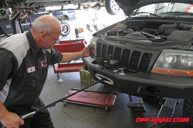 After connecting the winch power to the Jeeps battery, Bill plugged in the remote to make sure it was fully operational. 