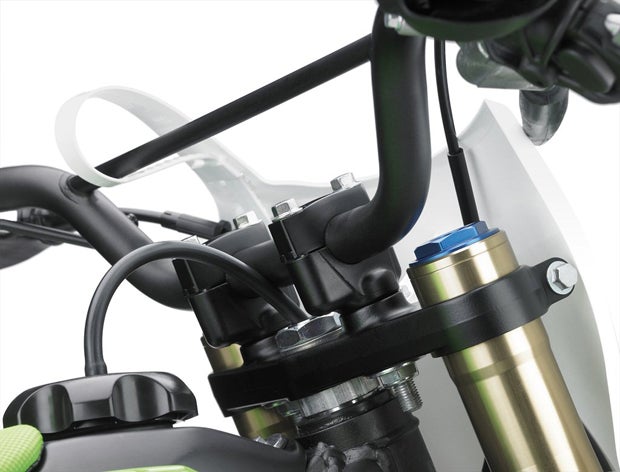 New handlebars are found on the 2014 KX85 and KX100, and they are adjustable to six different positions for ideal comfort.  