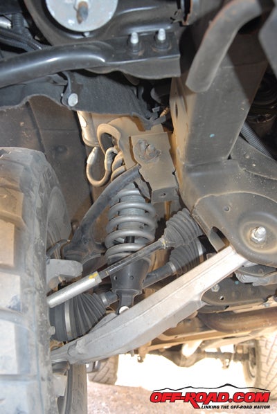 Upper A-arm and ball-joint are unique, lower arm is stock. Despite nearly 10,000 hard miles test Reapers have shown no issues with driveshaft joints.