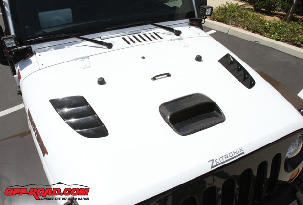 Road Race Motorsports vented hood pulls in cool air with the hood scoop and allows warm air to vent through its shark gill side vents.