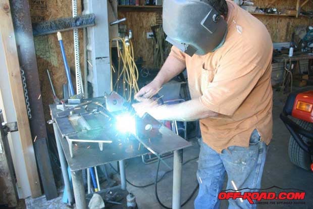 Kevin is welding up the winch plates strengthening rib, which makes the plate more rigid to better support the Ramsey 9500 winch.