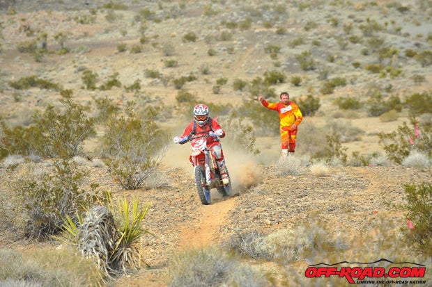 Nick Burson concentrates on chasing down teammate Justin Morrow en route to third place. Here, hes cheered on by Gary Sutherlin whose borrowed magazine test bike expired while the privateer was second and closing on Ramirez.