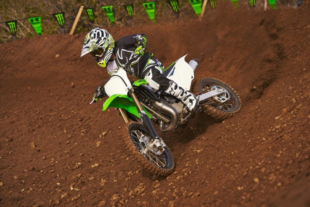The 2014 KX85 (shown) and KX100 both recieve their fair share of updates for the new model year. 
