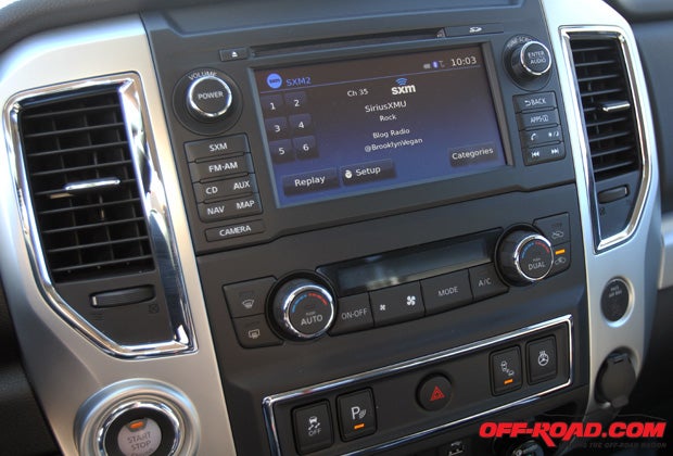 We like the layout and feel the center stack controls are relatively easy to use, but the 7-inch touchscreen infotainment system still feels a bit dated. 