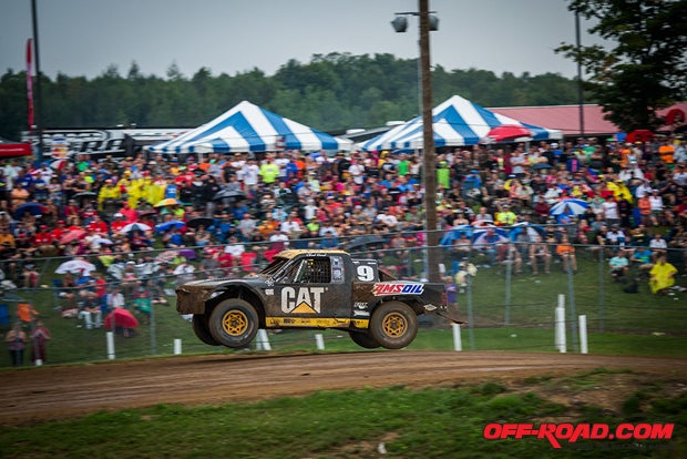 Fan always pack in at Crandon over Labor Day weekend. Chad Hord zips past the crowd. 