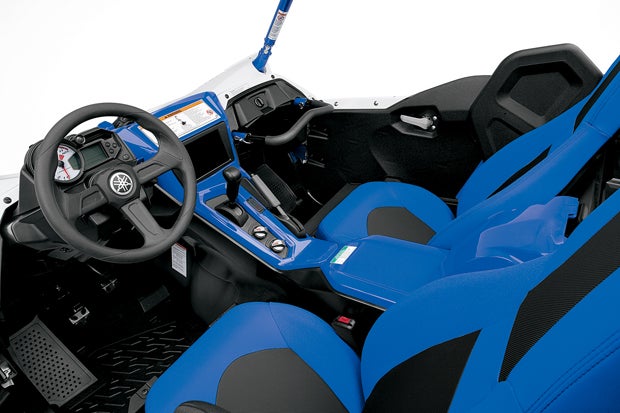 Along with three pedals on the floorboard, the Yamaha also features a manual shifter for its five-speed sequential gearbox.