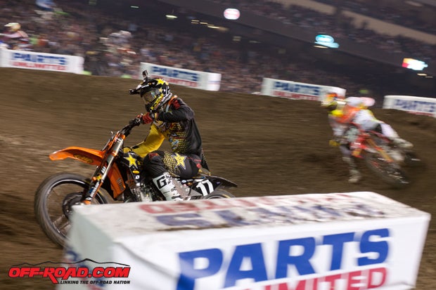 Jason Anderson (left) pulled a dramatic pass on Cole Seely (right) two turns from the finish to steal the 250cc Western Region main event win at Anaheim I. 