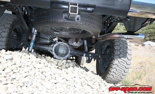 Rear lift is achieved with leveling blocks and extended-length Superlift SS shocks by Bilstein. Exhaust flow and sound are improved by a Magnaflow cat-back system.
