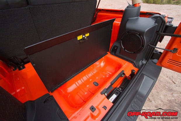 A Mopar lockable rear cargo tray keeps valuables safe in this hidden compartment. 