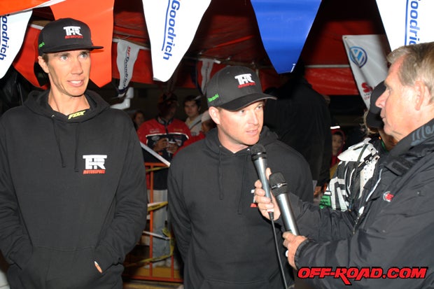 Steve Hengeveld (middle) talks about the race as teammate Robby Bell (left) looks on.